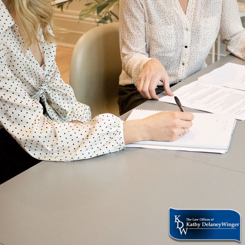 woman discussing business succession documents image